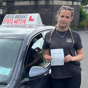 Hollie with her pass certificate